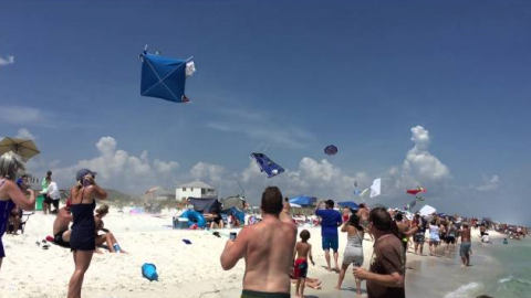Blue Angel Sneak Sends Tents, Umbrellas Flying | Frontline Videos