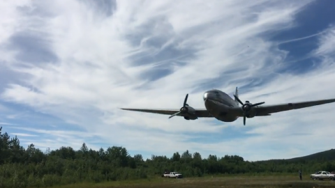 C-46 does a pass on remote Alaskan grass strip | Frontline Videos